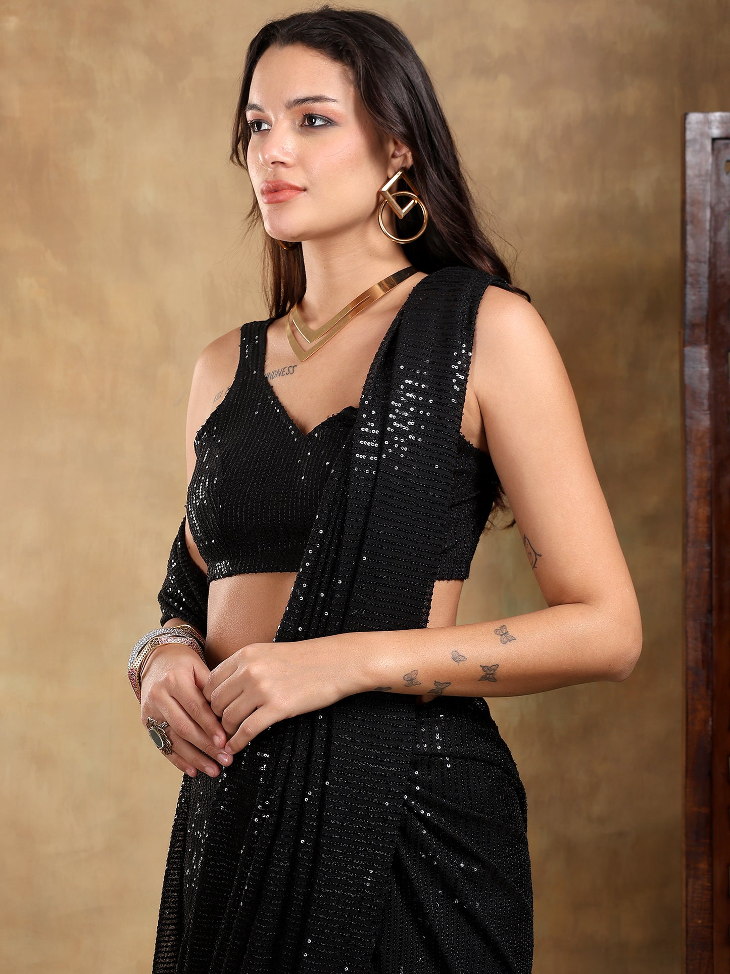 Black sequence with black base stitched saree