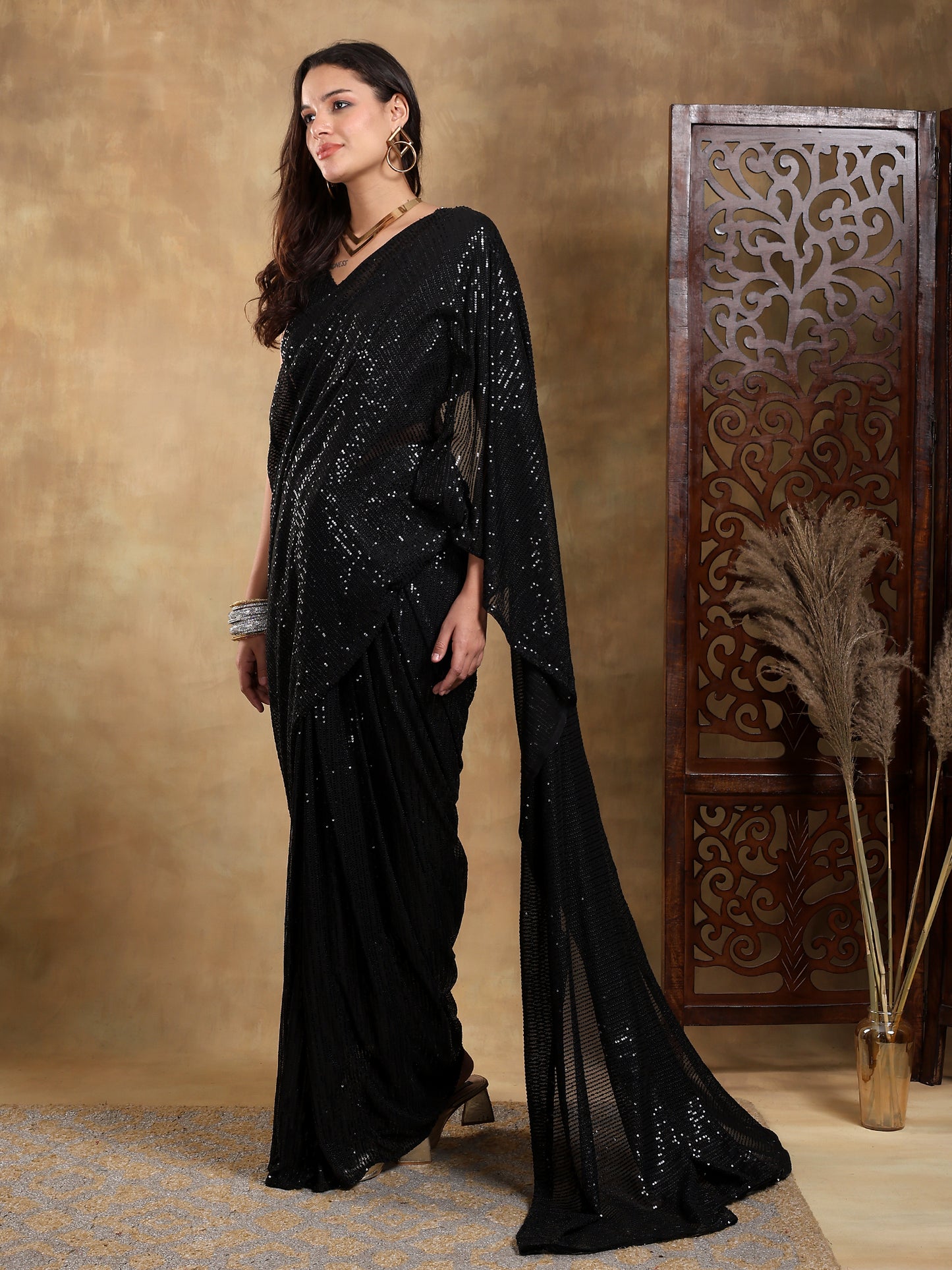 Black sequence with black base stitched saree